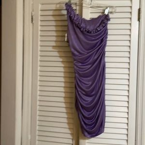 Very sexy one shoulder asymmetrical stretchy slightly shiny and soft mini dress.